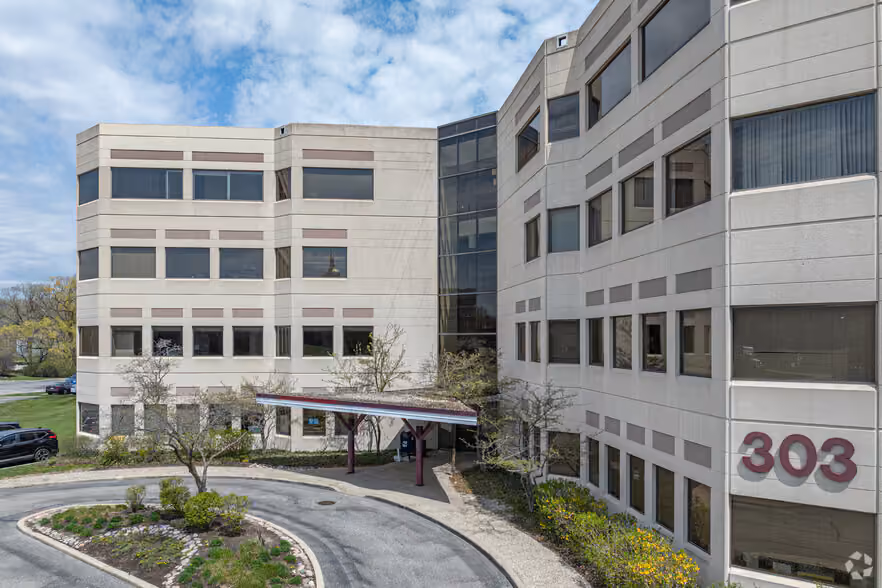The entry court at 303 East Army Trail Road — Today