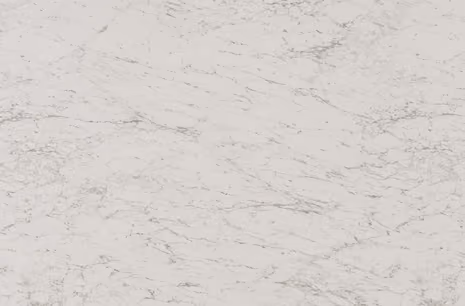 Plastic laminate countertop in a white marble pattern with fine grey veining